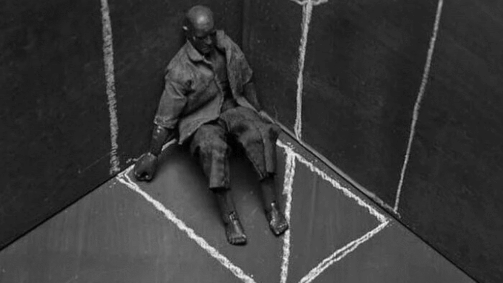 Man Sitting Alone by the corner